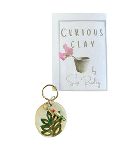 CURIOUS CLAY - Keyring